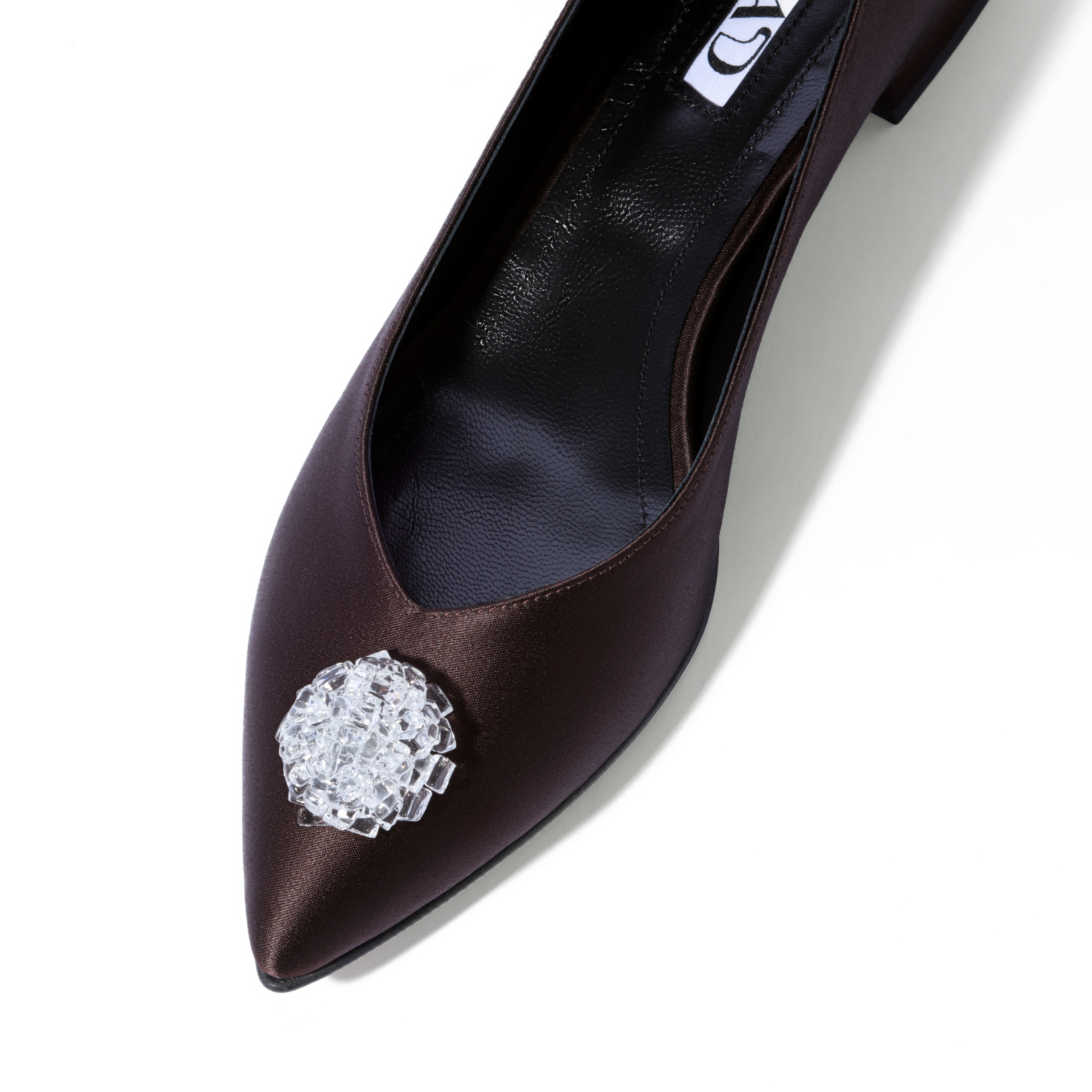 Brown satin ballerina flats with crystal accessory