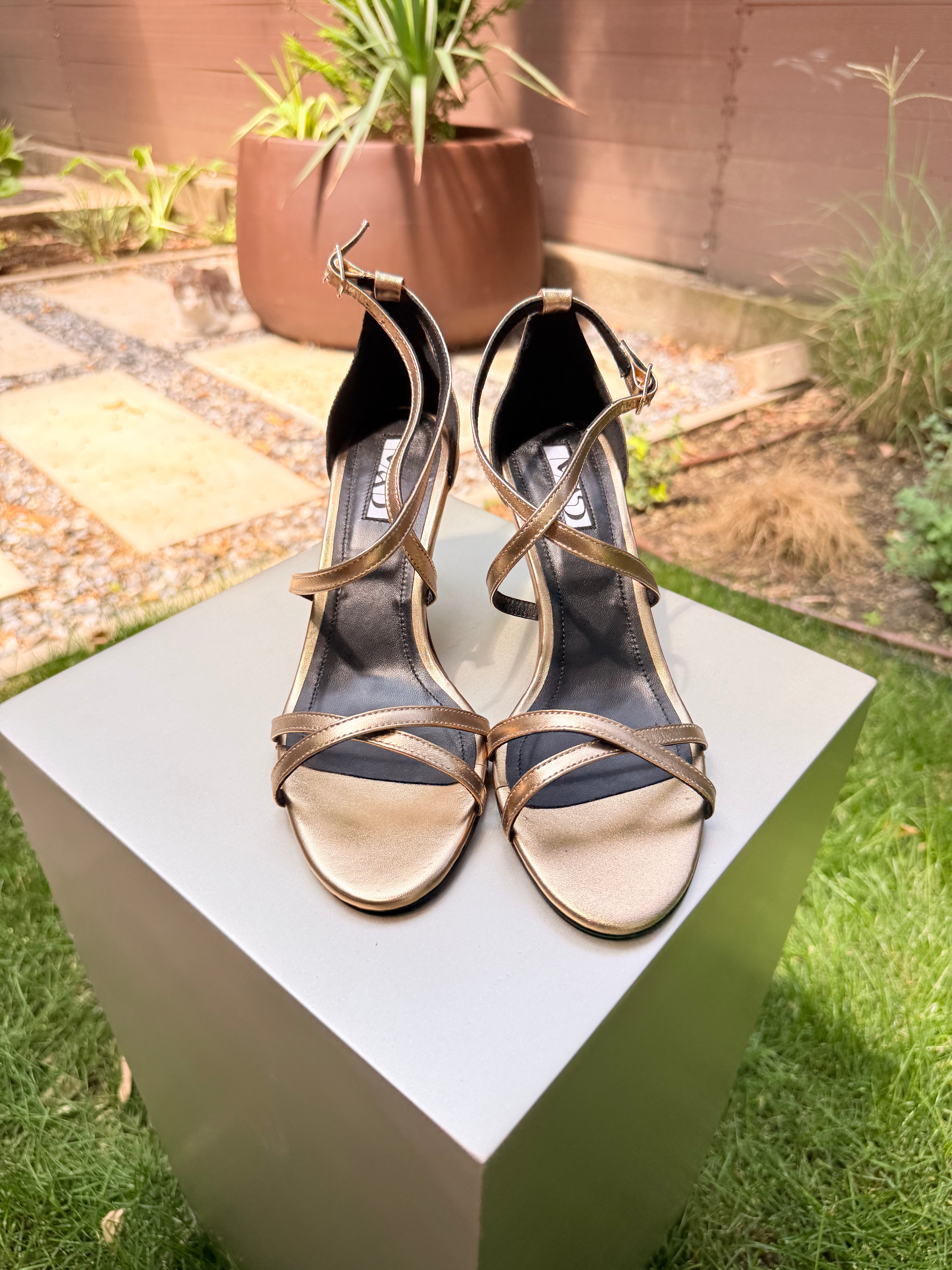 The Mad Sandal in gold leather