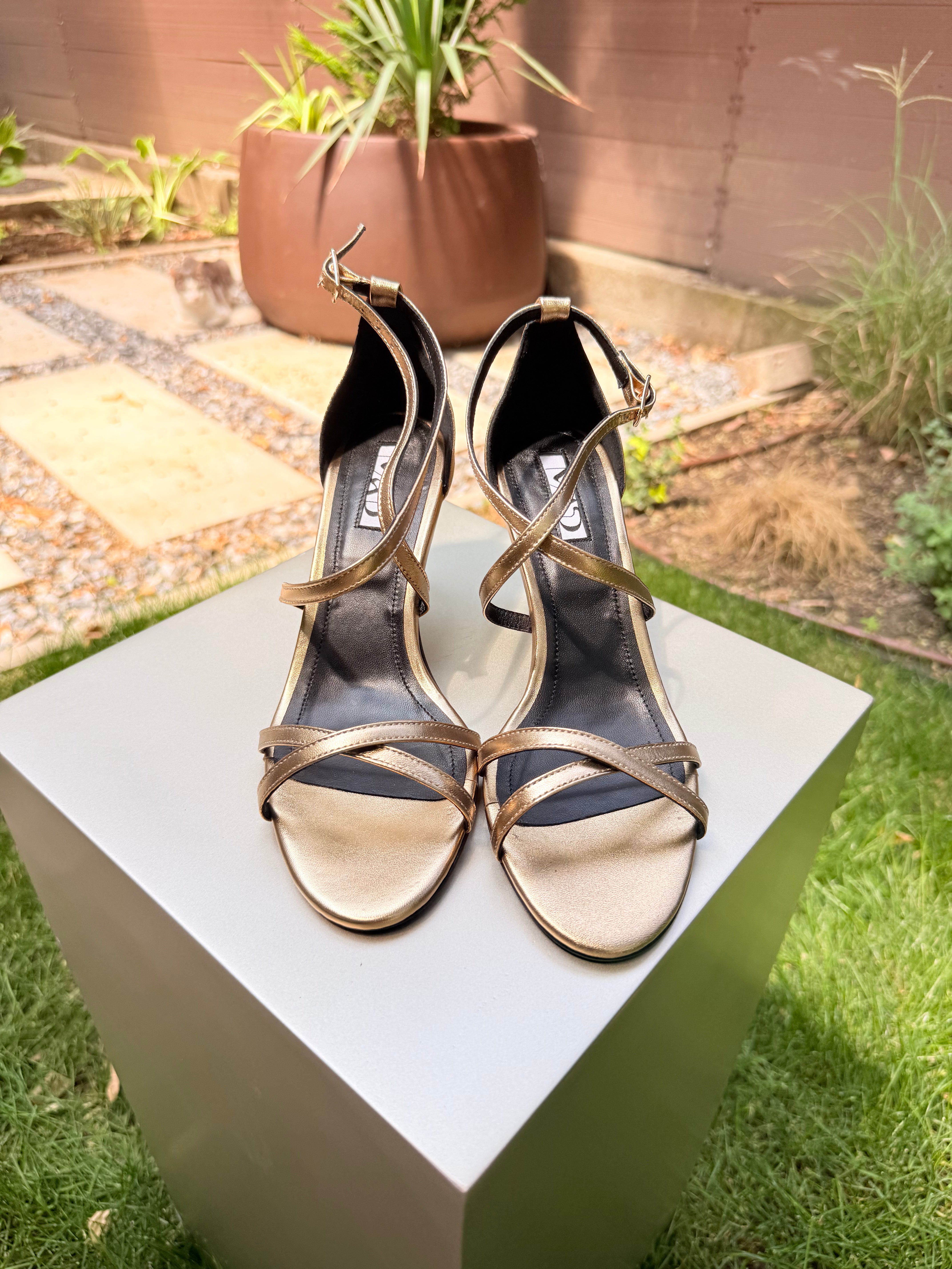The Mad Sandal in gold leather