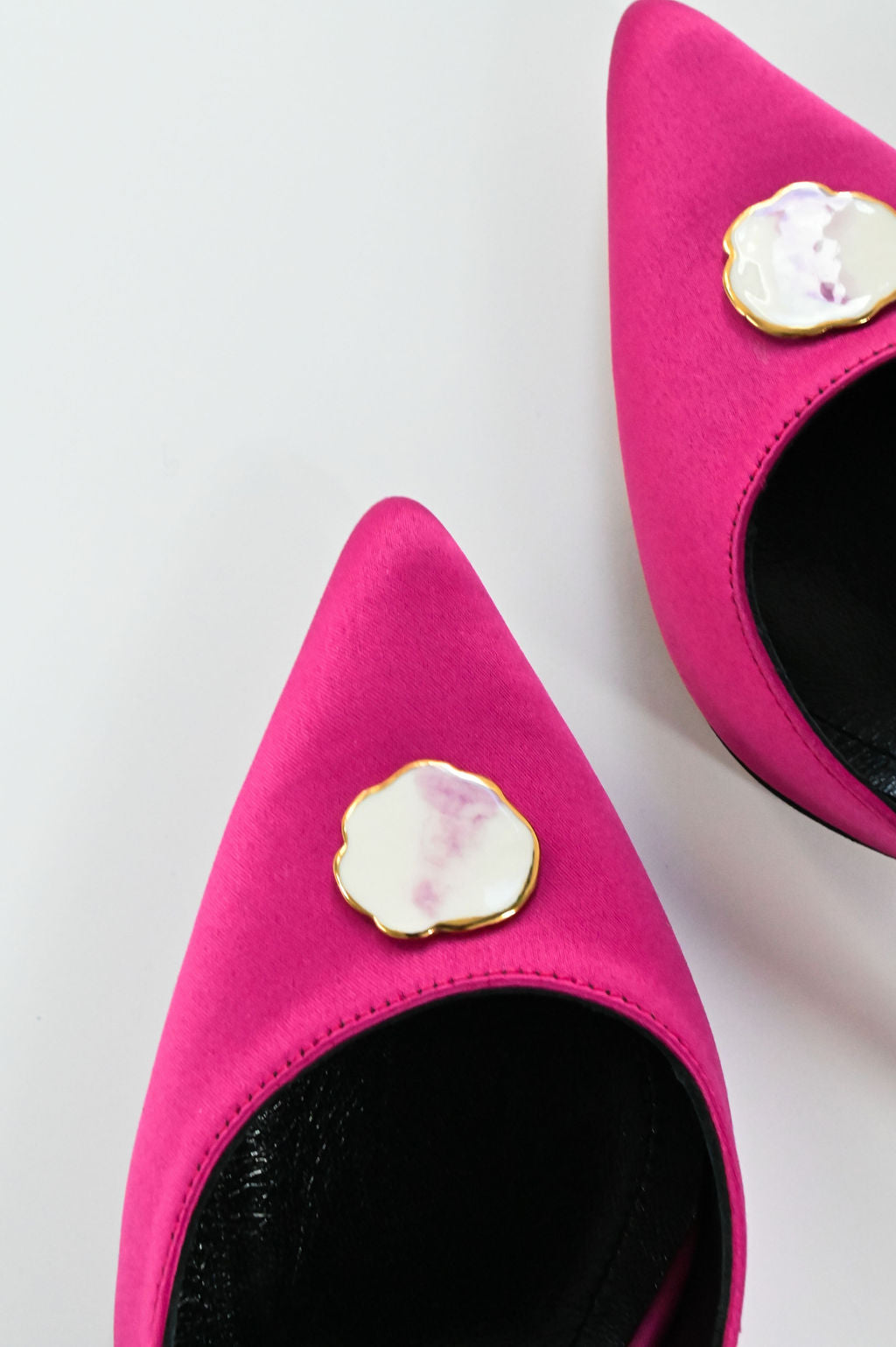 fuchsia satin stilettos 10 cm with round porcelain accessory pair detail