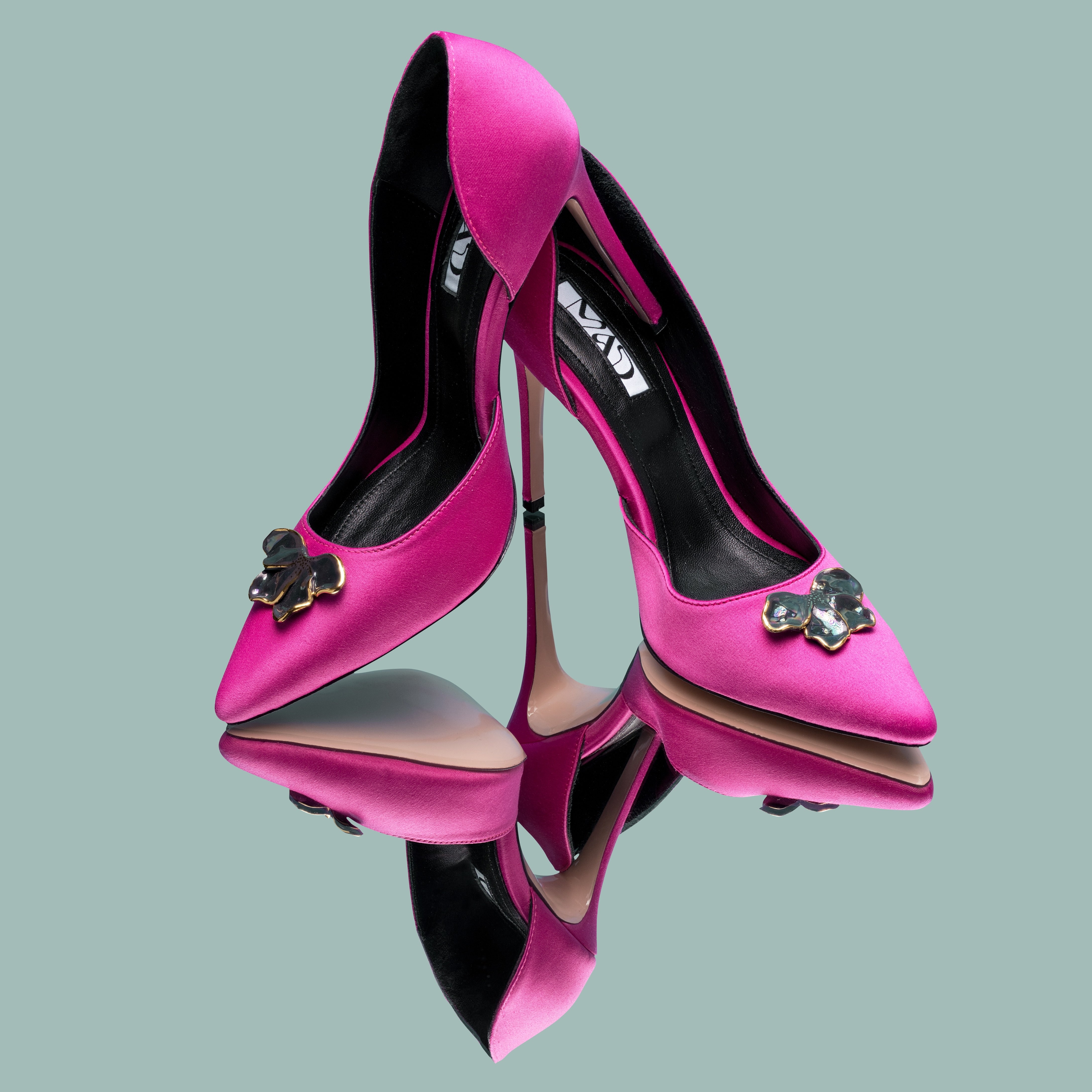fuchsia satin stilettos 10cm with flower accessory on mirror
