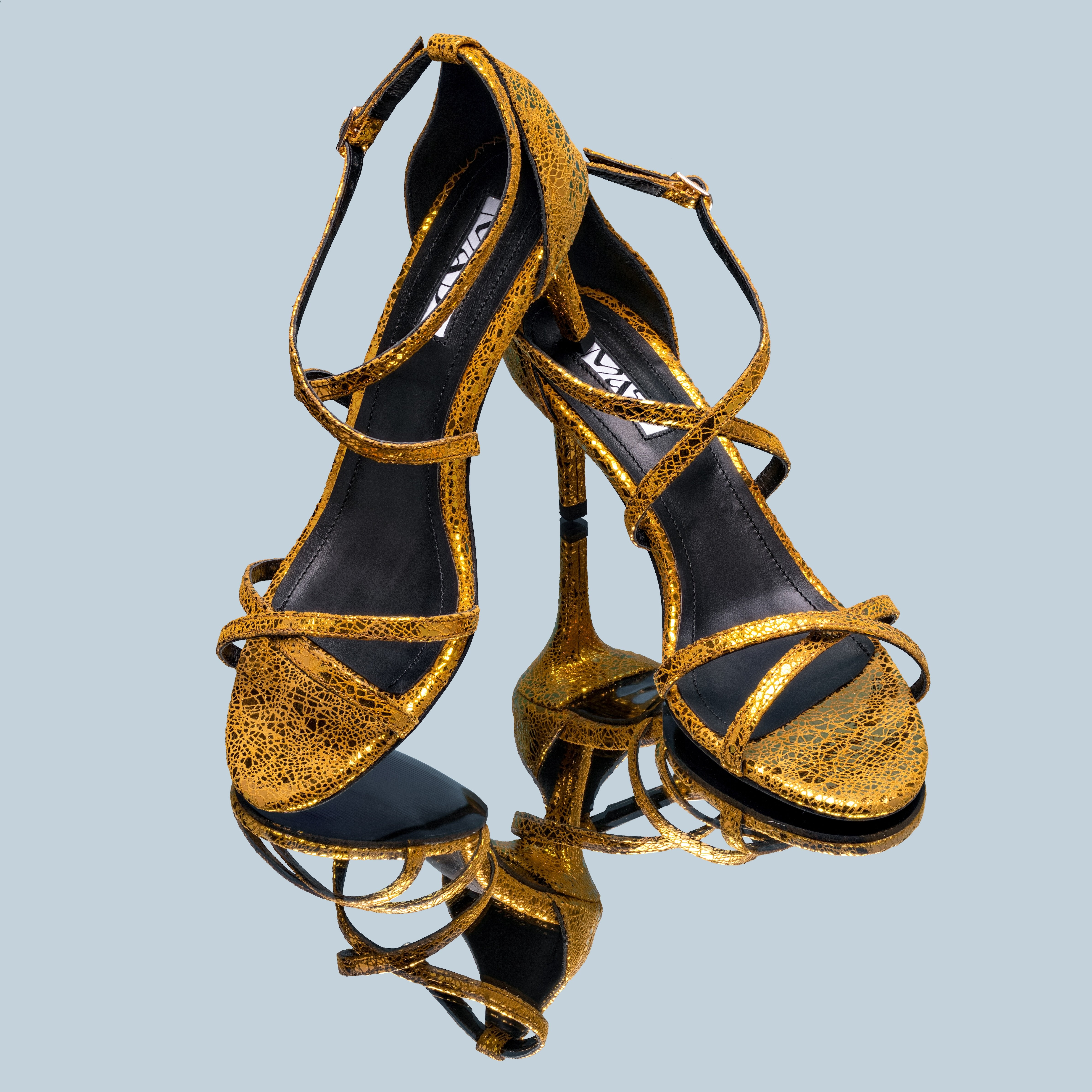 gold leather sandal 5 cm on mirror