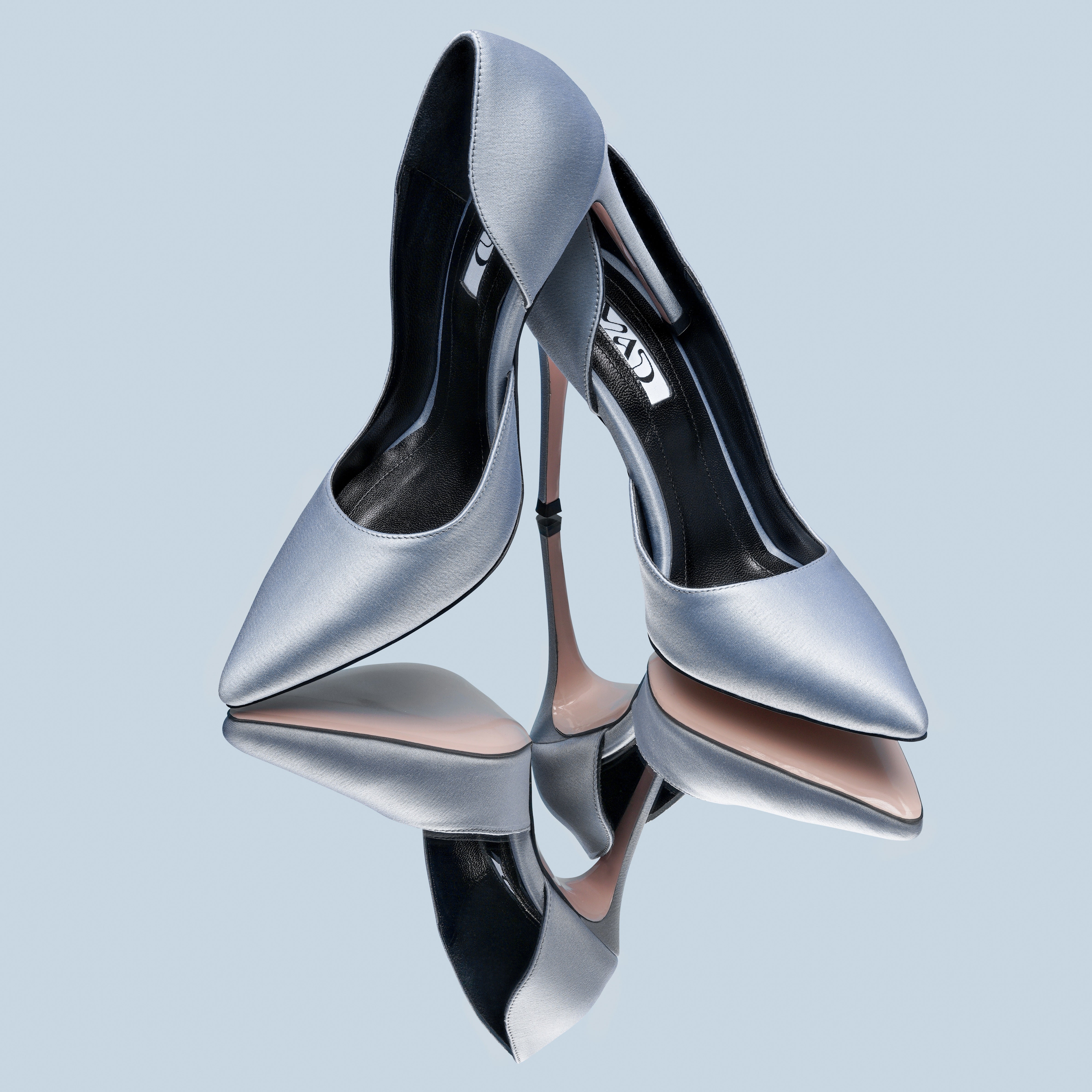 silver satin stilettos 10 cm on mirror