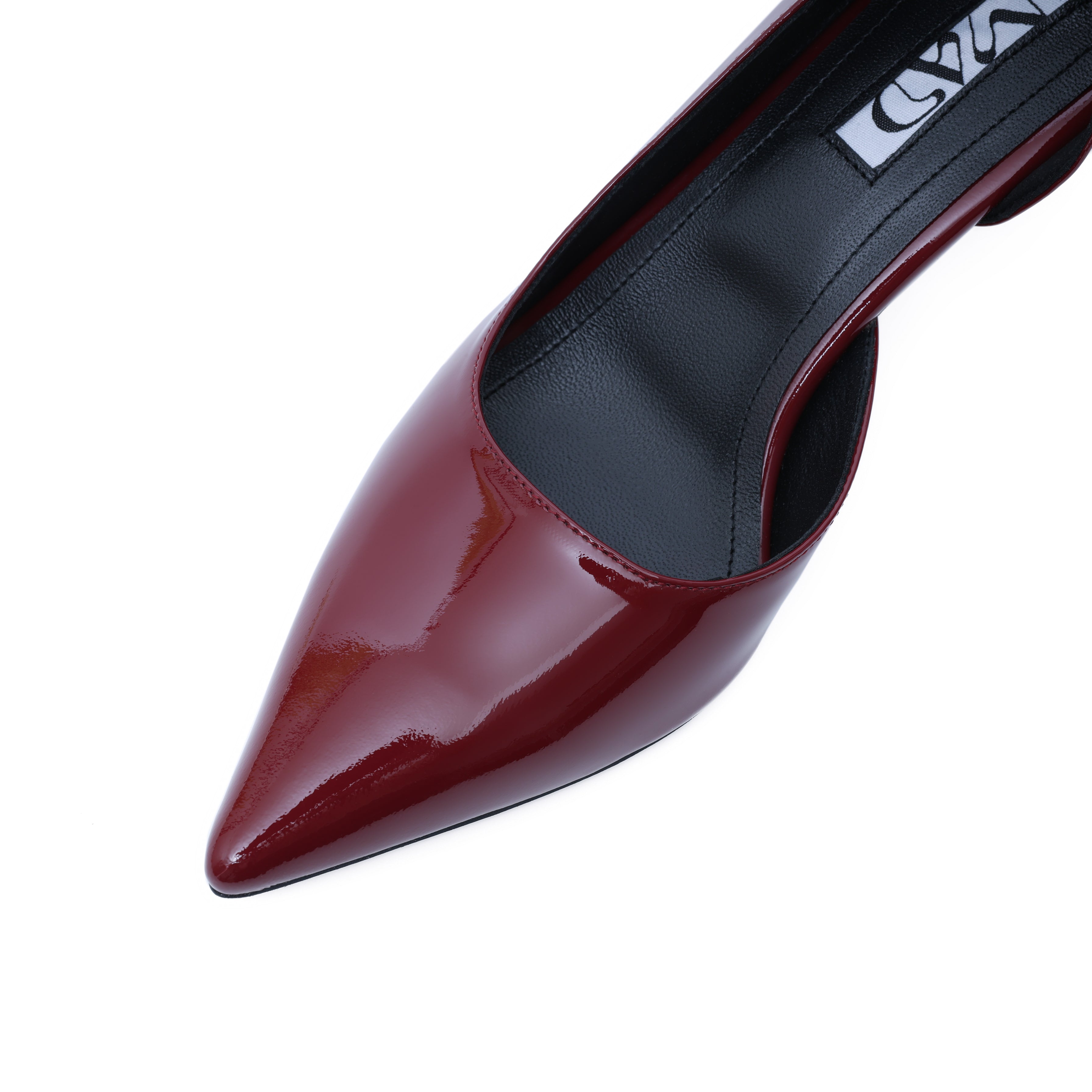 close-up of pointed toe stiletto patent leather burgundy 